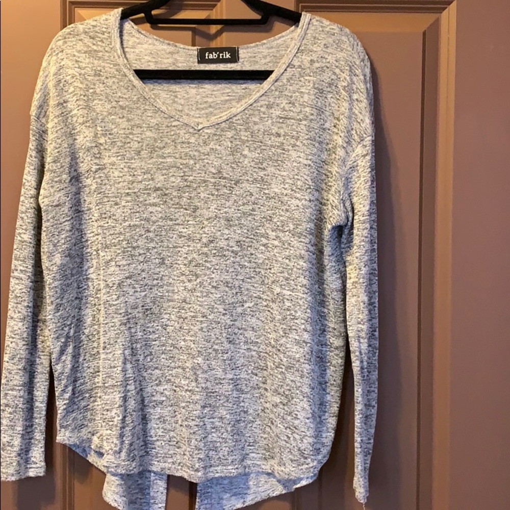 V-neck long sleeve with open back.